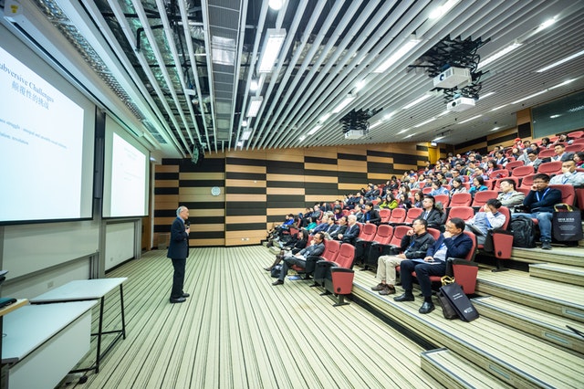 Man standing in front of an audience